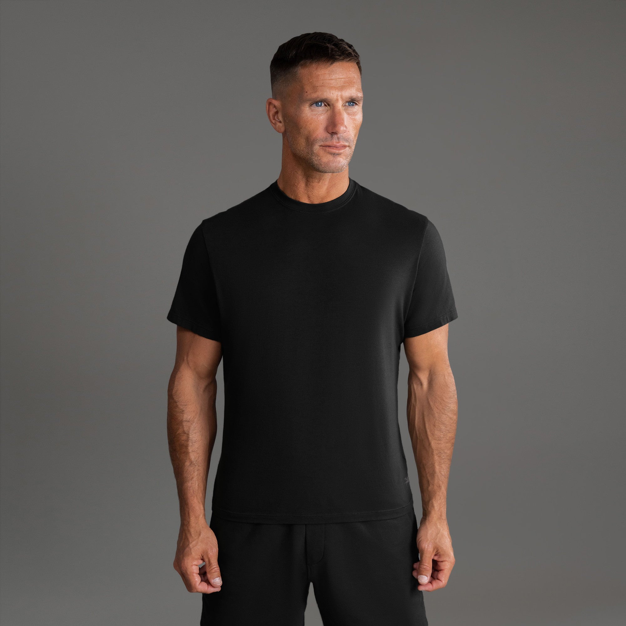 Man wearing the Cumulus Crew T-shirt in Core Black